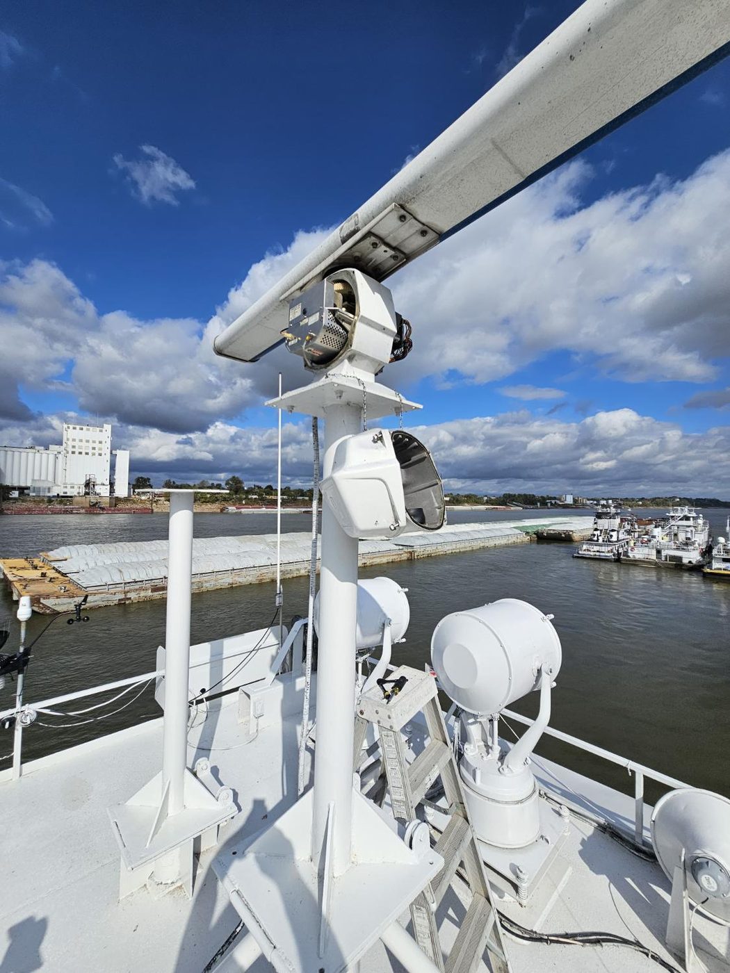 Radar, horns and searchlights on vessel deck